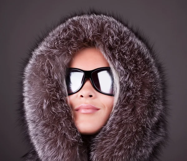 Portrait of young sexy woman in coat — Stock Photo, Image