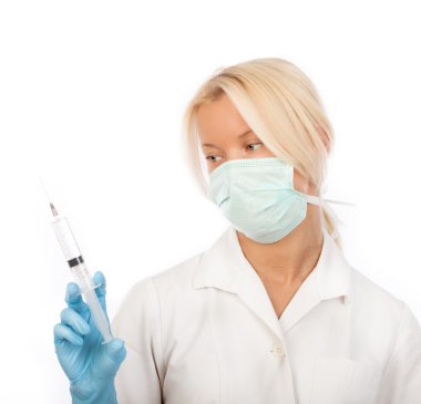 Attractive nurse with syringe in hands clipart