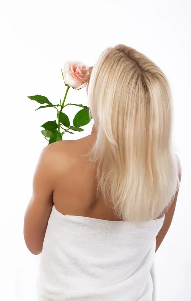 Av blondin med blomma — Stockfoto