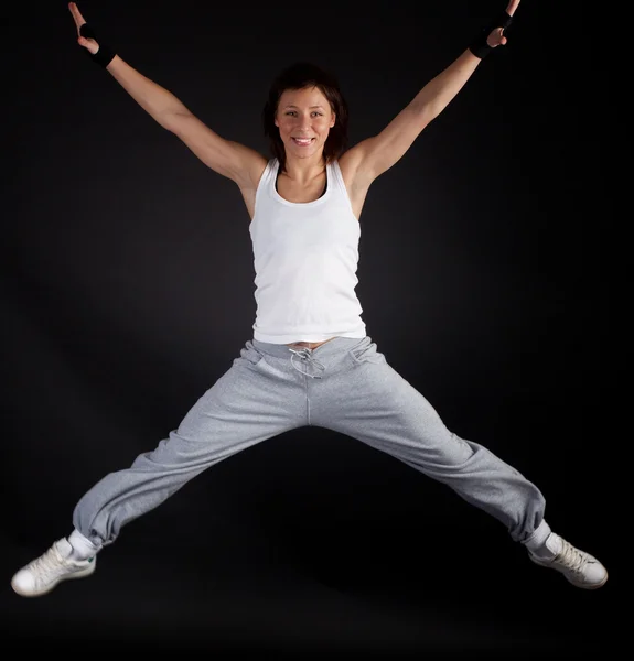 Happy young athlete during exercise — Stock Photo, Image