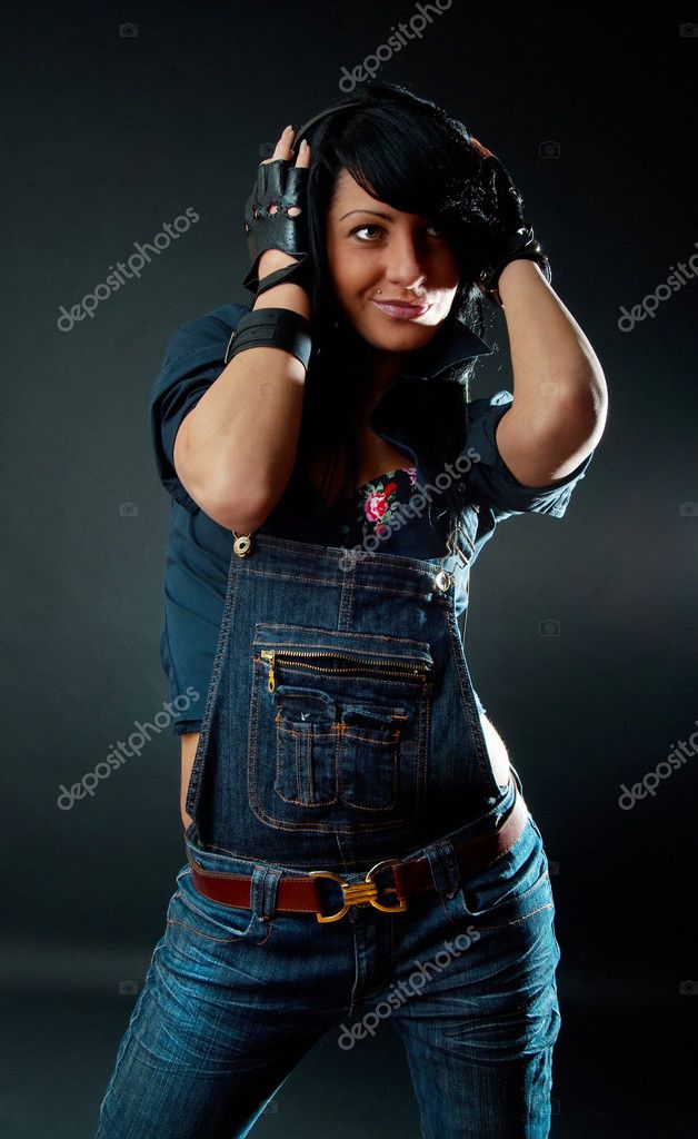 Young female holding headphones Stock Photo by ©fxquadro 1537857