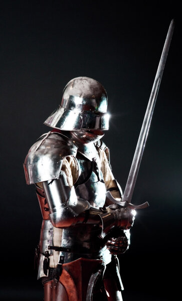 Powerful heavy fighter with sword and helmet