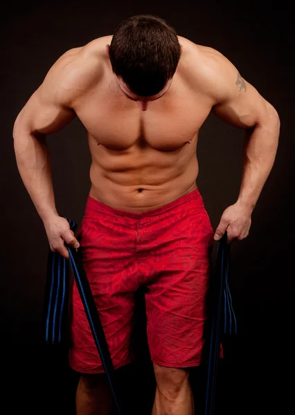 Bodybuilder met touw — Stockfoto