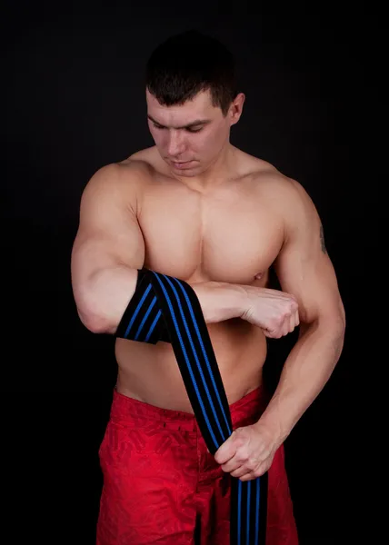 Atlet ile sarılmış eller — Stok fotoğraf