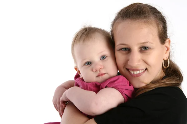 Молодая привлекательная мать с симпатичным ребенком — стоковое фото
