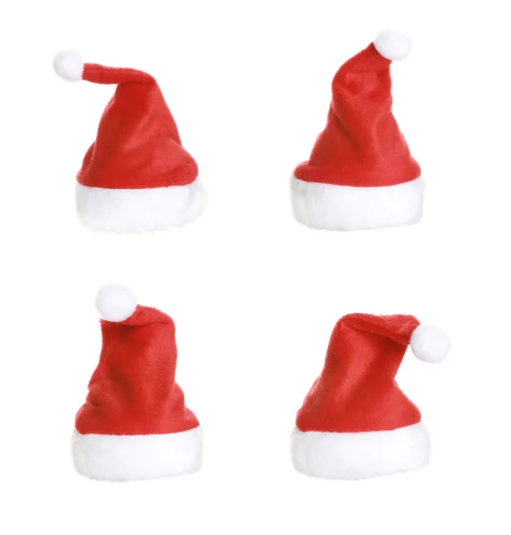 Chapéus de Natal em fundo branco — Fotografia de Stock