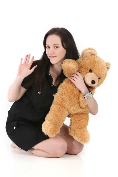 Молода красива жінка з плюшевим ведмедем — стокове фото