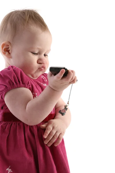 Lille pige med mobiltelefon - Stock-foto