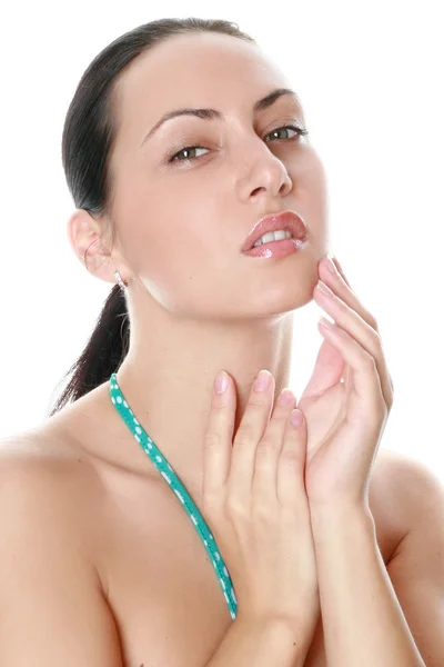 Mulher bonita massageando seu rosto — Fotografia de Stock