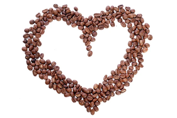 Kahve çekirdekleri kalbinde — Stok fotoğraf