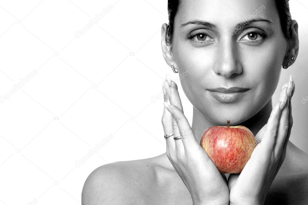 Beautiful woman with apple