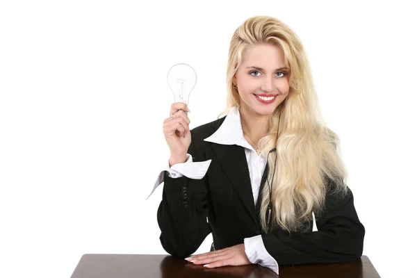 Business woman with a light bulb — Stock Photo, Image