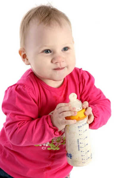 Malá holčička v růžovém saku — Stock fotografie