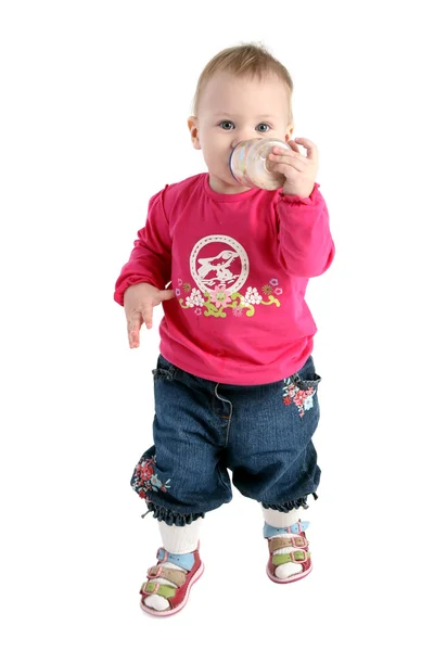Little baby girl in a pink jacket — Stock Photo, Image