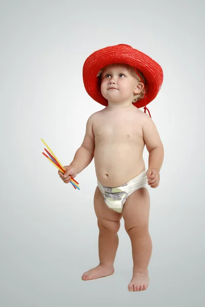 Chlapeček v červených kovbojský klobouk — Stock fotografie