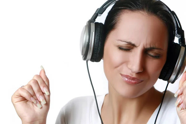 Beautiful women listening music — Stock Photo, Image