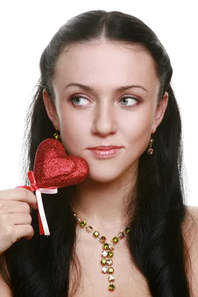 Chica sosteniendo corazón rojo — Foto de Stock