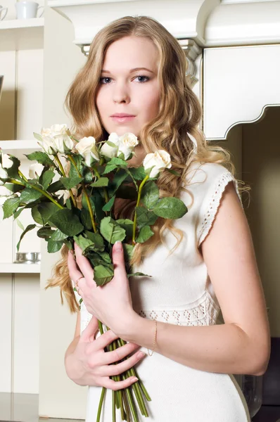 Blonde with flowers — Stock Photo, Image