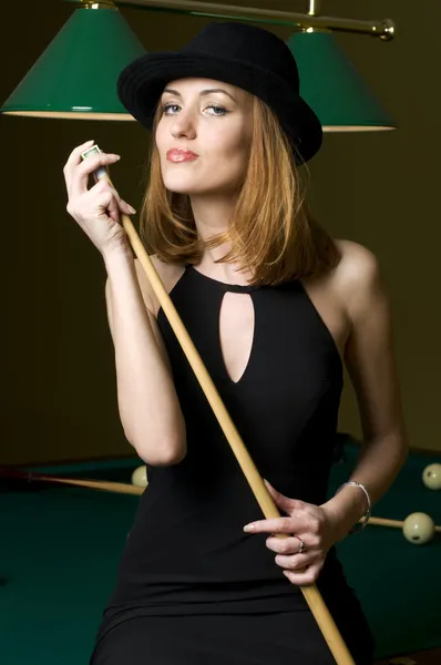 Blonde with cue — Stock Photo, Image