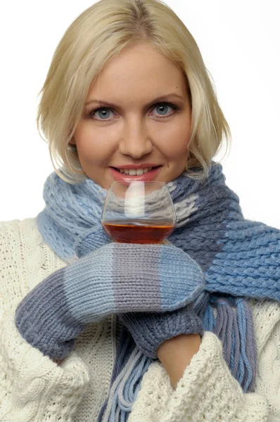 Blonde girl is drinking the cognac — Stock Photo, Image