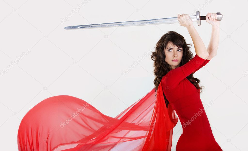 Young beautiful girl with a sword