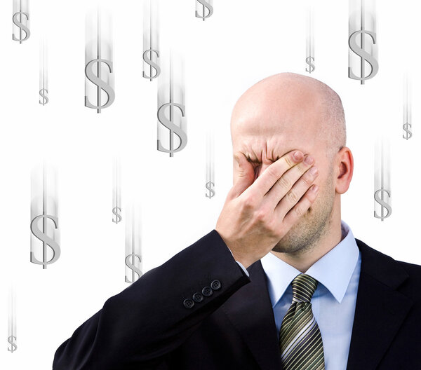 Businessman suffers from a headache