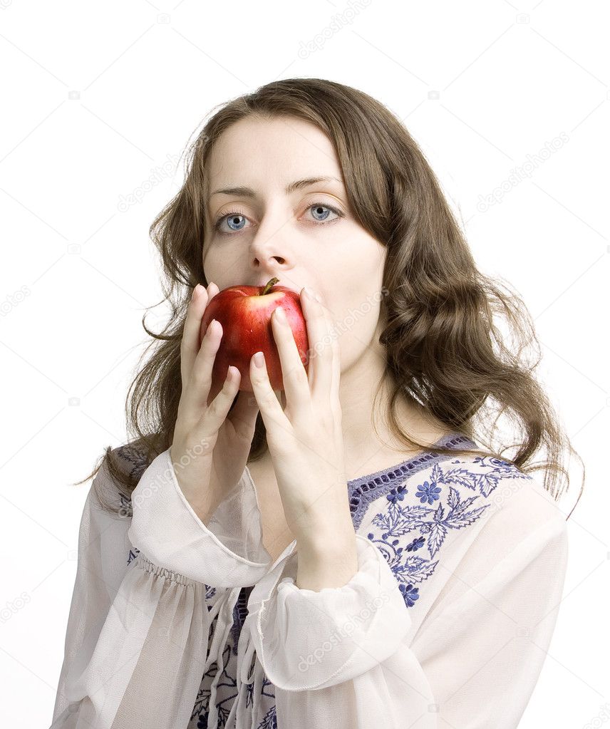 Girl eats an apple