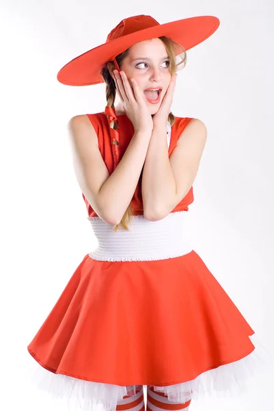 Překvapený dívka v červené barvě — Stock fotografie