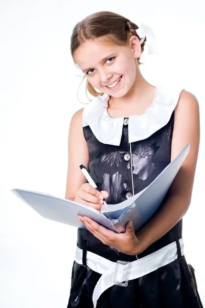 Writing schoolgirl — Stock Photo, Image