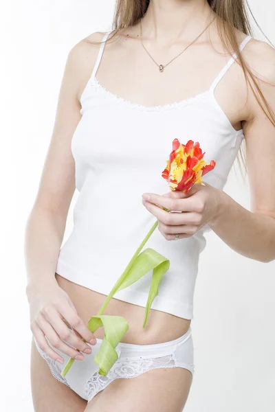 Woman and tulip — Stock Photo, Image
