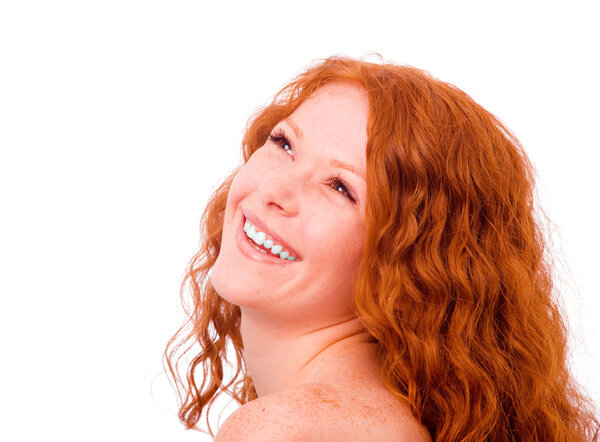 Toothy smiling redheaded girl