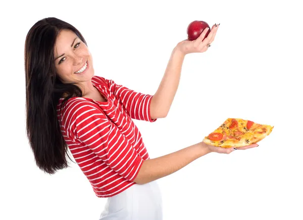 Cutie juggles with apple and pizza Royalty Free Stock Images