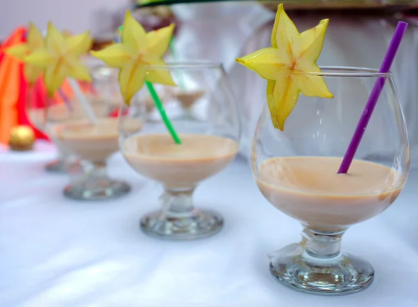 Stock image Glasses with liquor and carambola