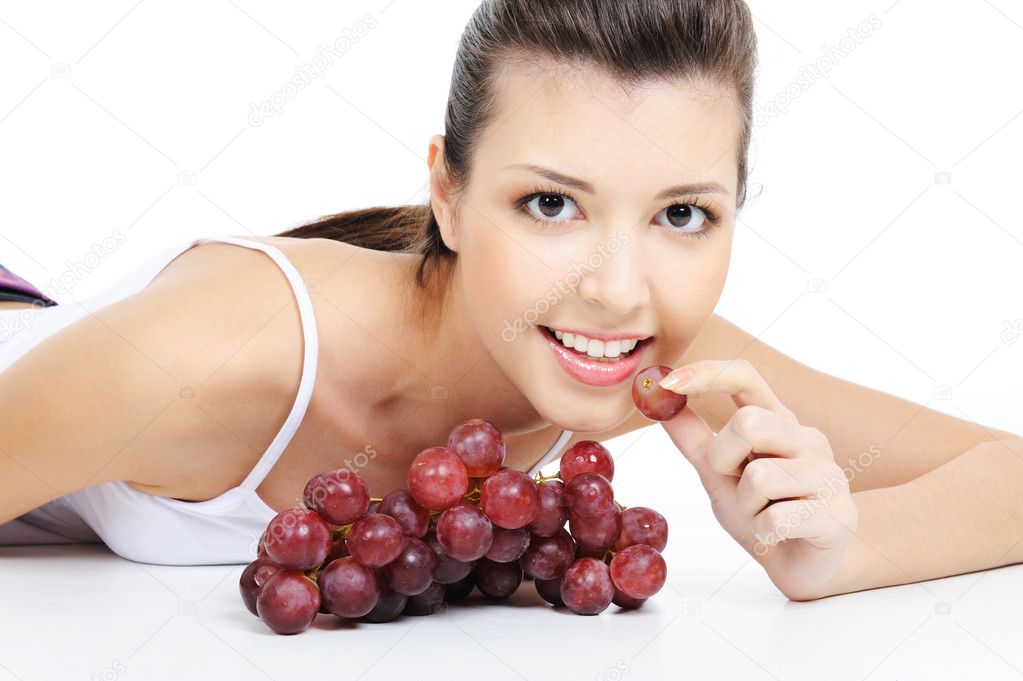 Girl eating grape — Stock Photo © valuavitaly 1477695