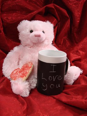 Pink bear with heart cookie and mug clipart