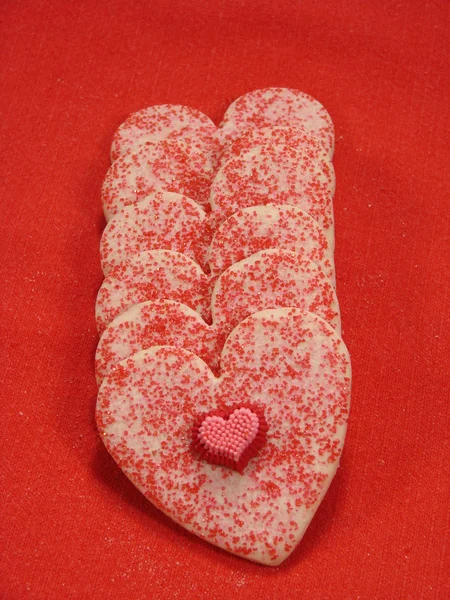 Srdce cukroví na červené — Stock fotografie