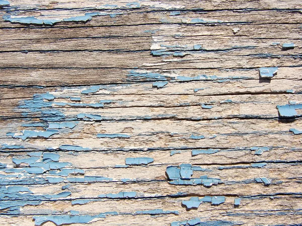 Checked and peeling blue paint on wood — Stock Photo, Image