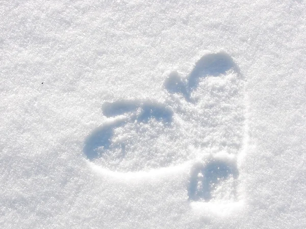 stock image Imprint of a pair of mittens in snow