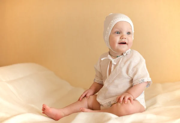 Little kid dressed in white — Stock Photo, Image