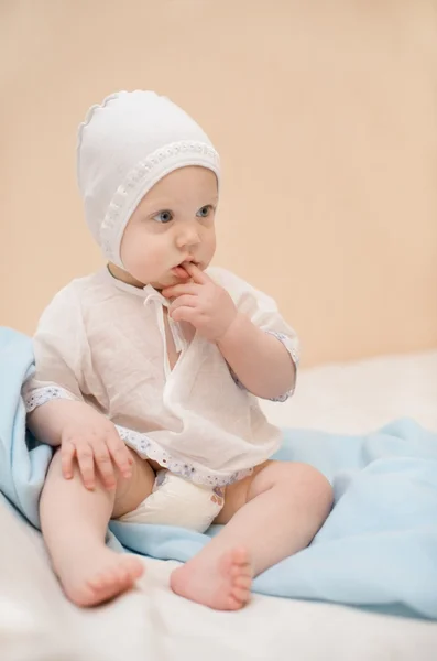 Cute child dressed in white — Stock Photo, Image