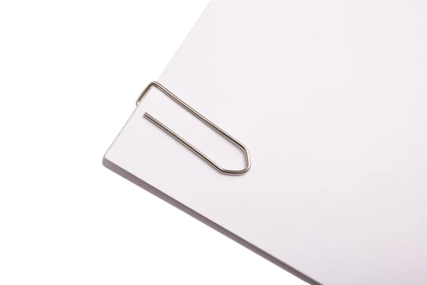 Paper clip on paper — Stock Photo, Image