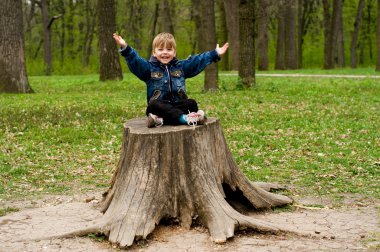 Little boy in wood clipart