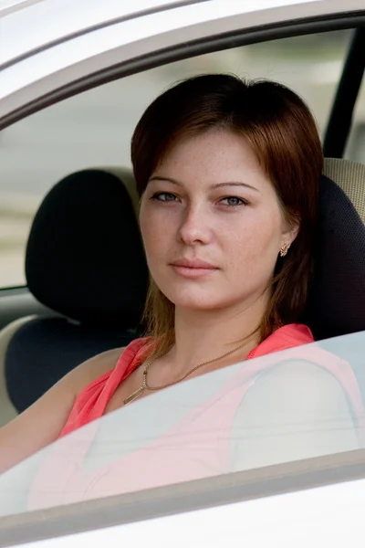 Woman in a car — Stock Photo, Image