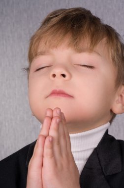 Boy praying clipart