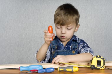 Boy with tools