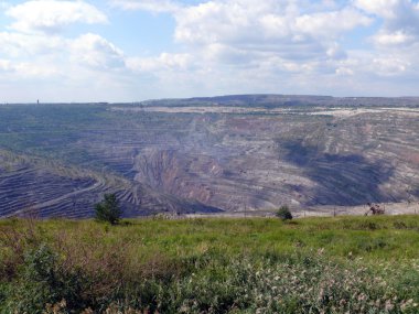 Open coal mine in town Korkino - Russia clipart