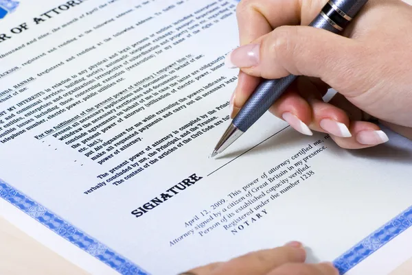 A signing of document — Stock Photo, Image