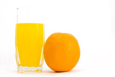 Glass of juice and orange