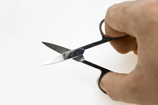 Otevřené nůžky v ruce — Stock fotografie