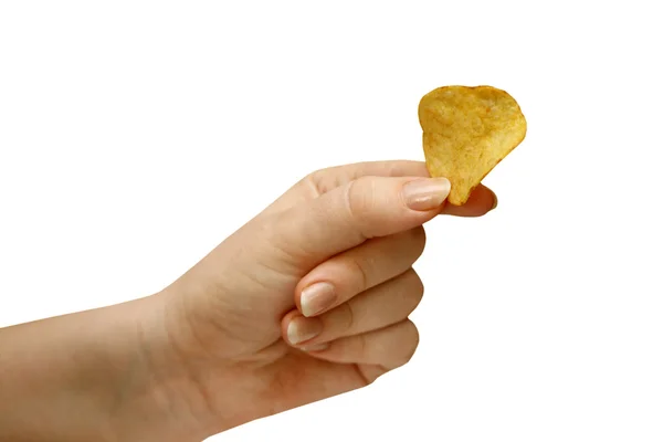 Рука держит картофельный чип — стоковое фото